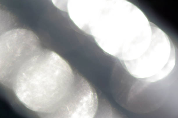 istock Abstract closeup shot flares and metal mesh 178993531