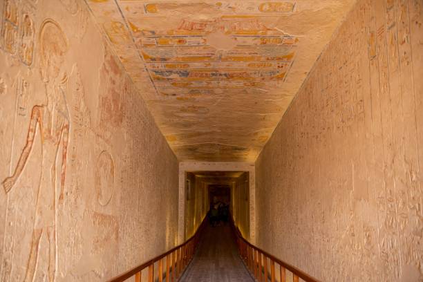 istock a narrow passageway leading up to some ancient wall paintings next to a wood floor 1789935604