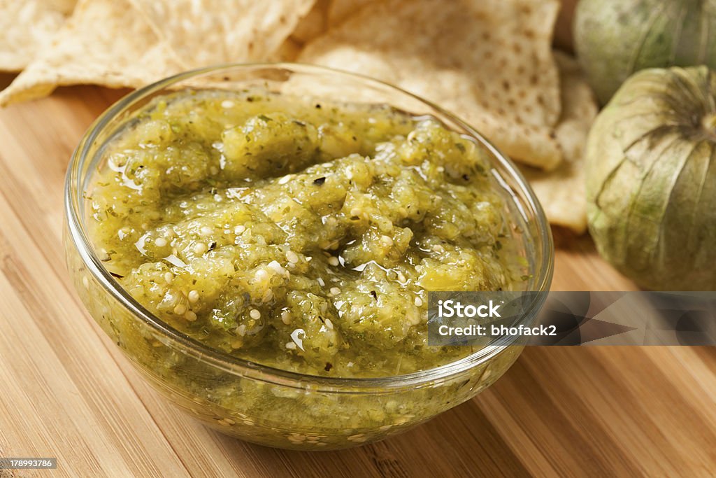 Fresh Homemade Salsa Verde Fresh Homemade Salsa Verde with tortilla chips Dessert Topping Stock Photo