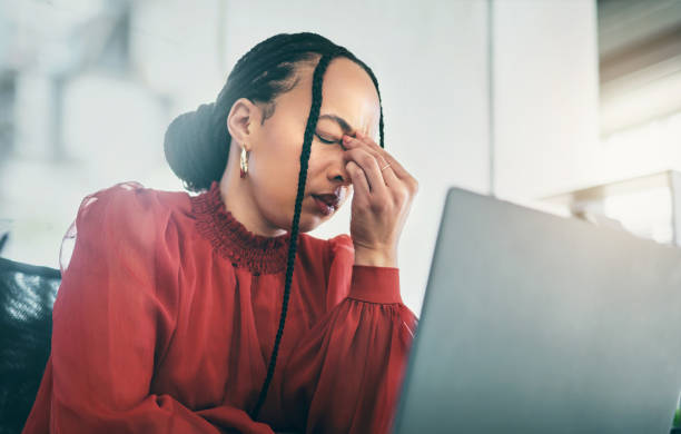 istock Laptop, headache and business woman frustrated with 404 error, software fail or administration mistake. Secretary, bad online results or admin person stress over computer problem, anxiety or migraine 1789950571