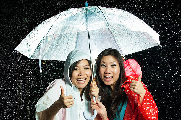 istock Asian women under the rain 178995122