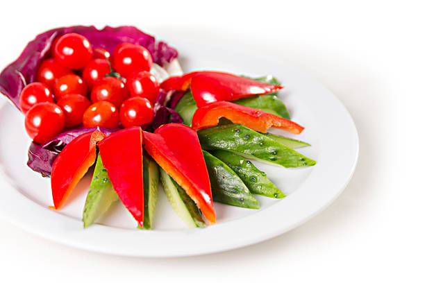 plate with sliced vegetables stock photo