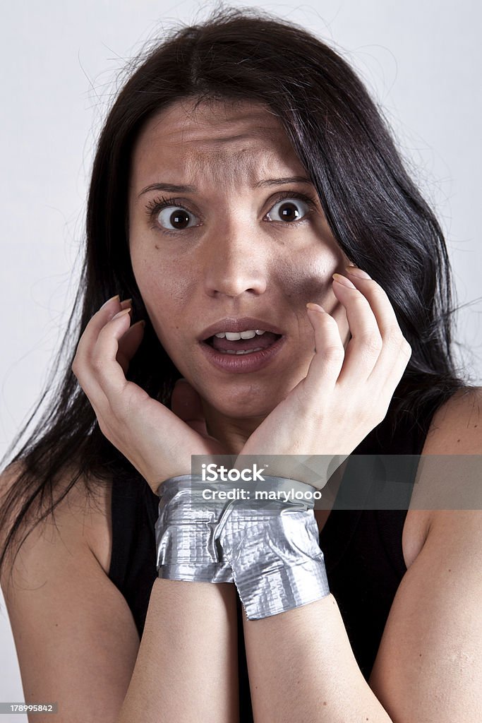 hostage young woman kidnapped young woman, hostage closeup on white background Adult Stock Photo