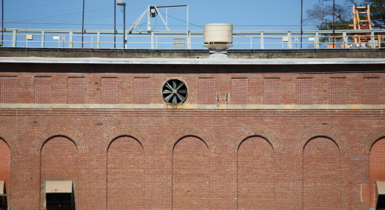 Red brick arches on top of an old hydroelectric dam