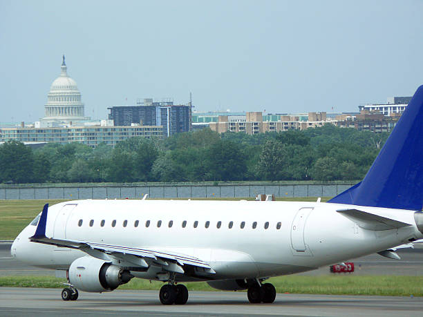 Airplane taxiing at DCA stock photo