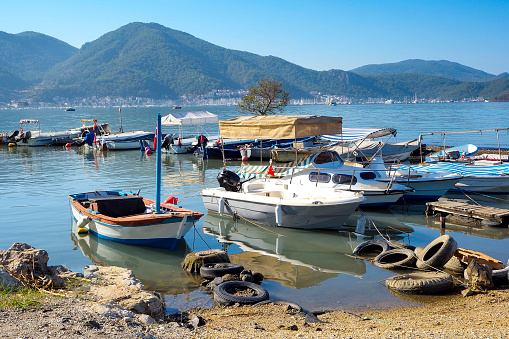 Boat on the beach. Seaside in Fethiye district of Muğla province in Türkiye.