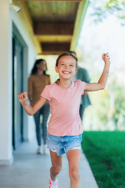 istock Happy little girl running 1789984861