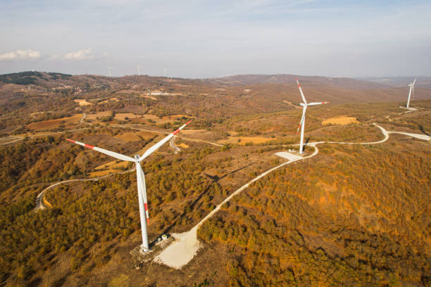 istock wind turbines in the forest area 1789985391