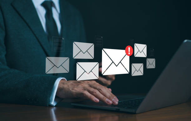istock Spam mail and Phishing email, Cyber security concept. Businessman checking e-mail and sending on computer. Alert spam virus with warning caution, Junk mail, Scam mail notification, Electronic mail, 1789986961