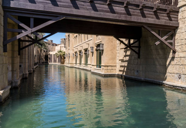 istock Wooden bridge over waterway in Souk Madinat Junction mall 1789988563