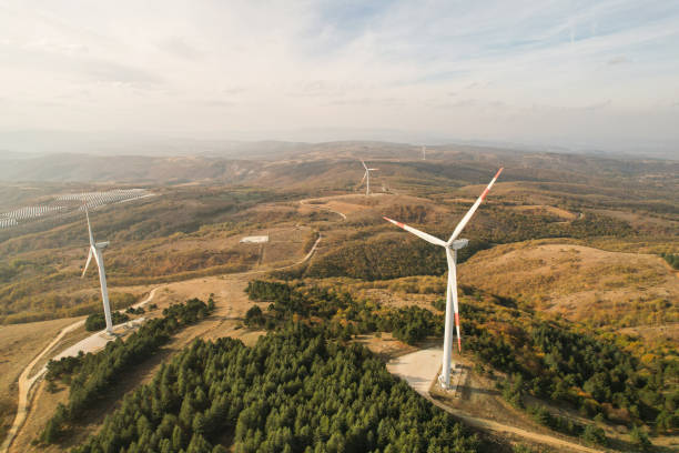 istock wind turbines in the forest area 1789993786