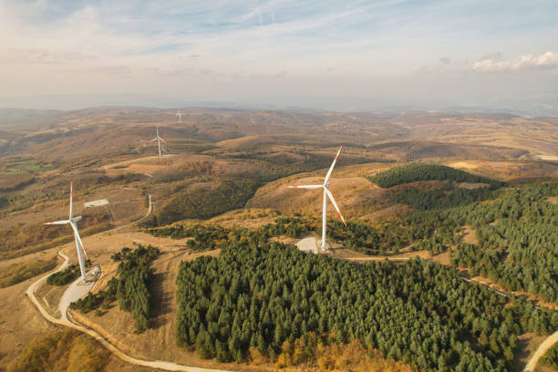 istock wind turbines in the forest area 1789993787
