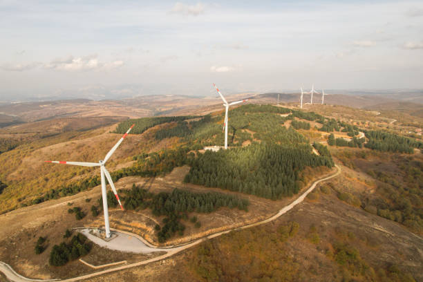 istock wind turbines in the forest area 1790000623