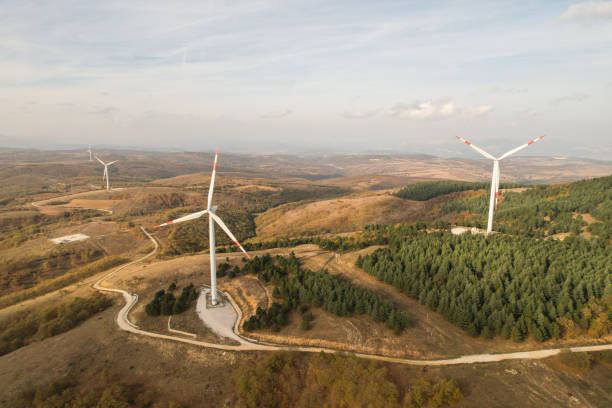 istock wind turbines in the forest area 1790000625