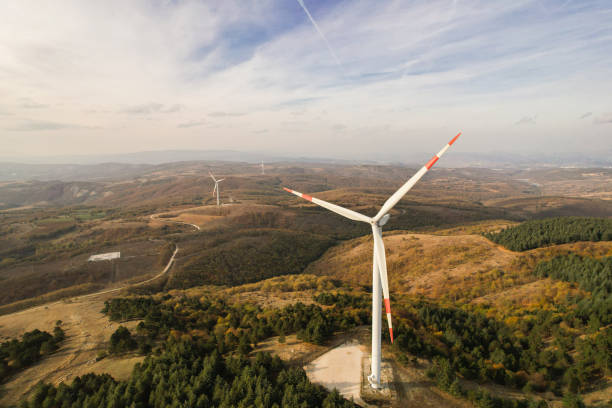 istock wind turbines in the forest area 1790003296