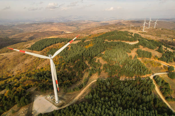 istock wind turbines in the forest area 1790003306