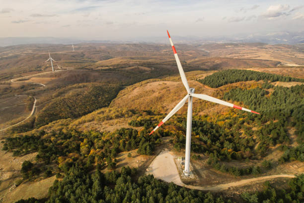 istock wind turbines in the forest area 1790003319