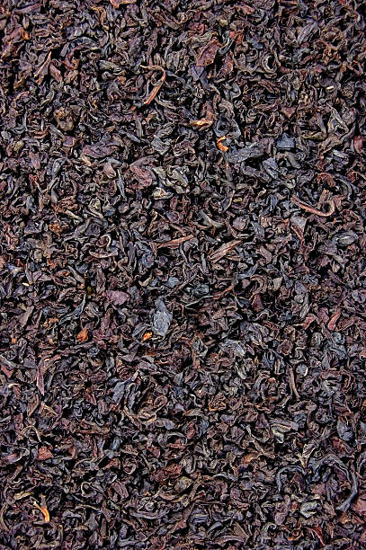 istock Detailed Black Loose Tea Leaf Texture Background 179000811