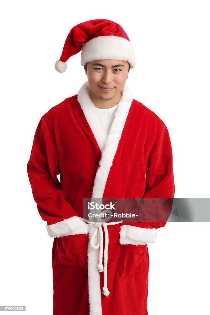 Serious santa Young asian Santa claus wearing a suit and hat. White background. Hat Stock Photo