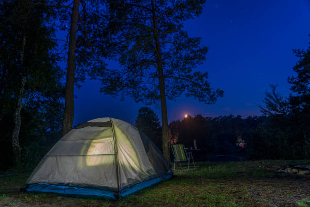 istock Tourist tent lighting at night in wildness 1790009317