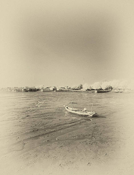 istock Wrecked boat at receding shore 179001329