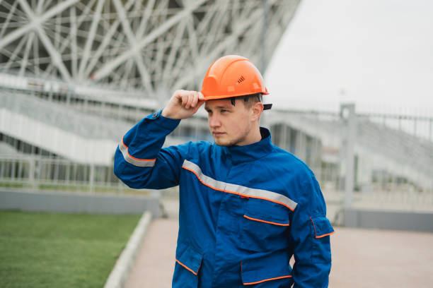 istock young male worker wearing protection head helmet while doing work 1790015244