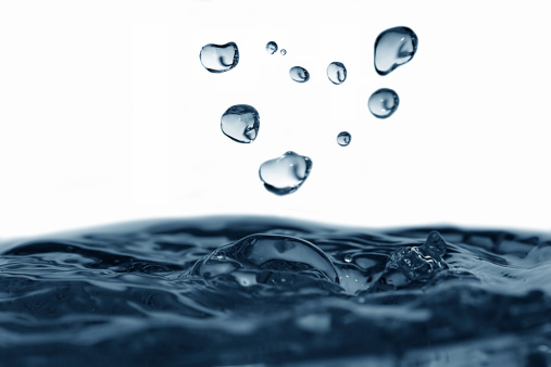 Water wave, transparent surface with bubbles