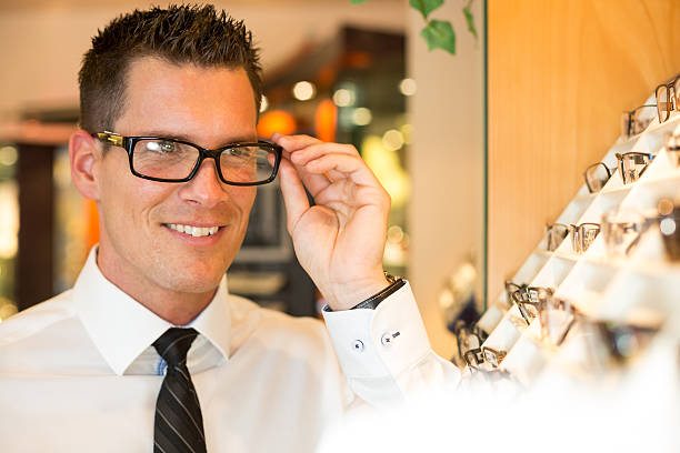 istock Customer in optometrist's shop choosing the right frame 179002167
