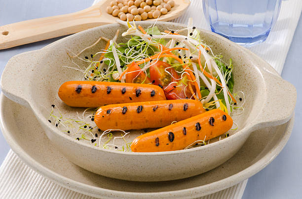 Vegetarian tofu sausage. stock photo