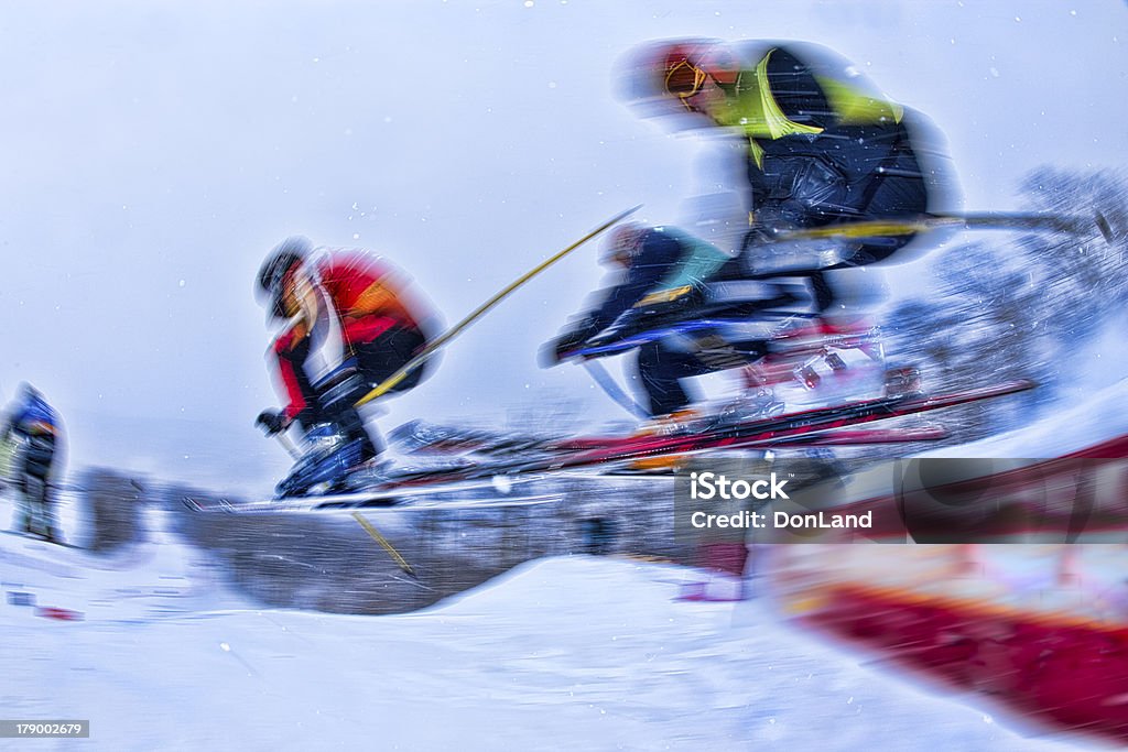 Four ski racers going over a jump. - Photo de Activité libre de droits