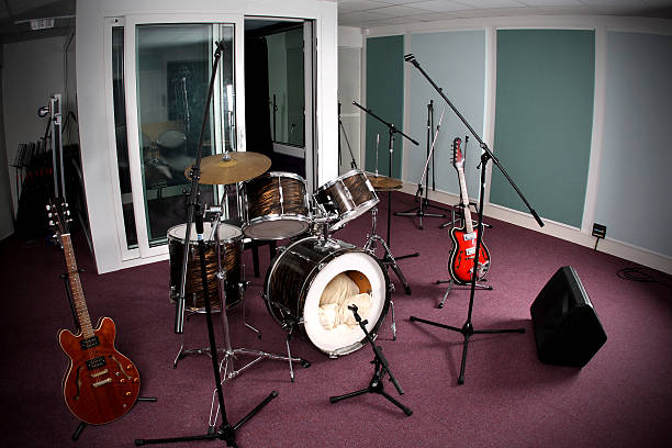 istock Recording studio set up with drums, guitar, and bass  179002940