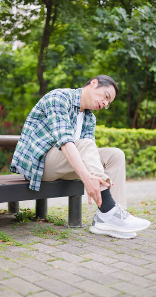 istock closeup man touch his ankle 1790031515