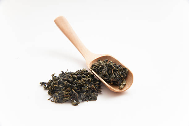 中国茶（タイ観音) - tea tea leaves jasmine tea leaf ストックフォトと画像