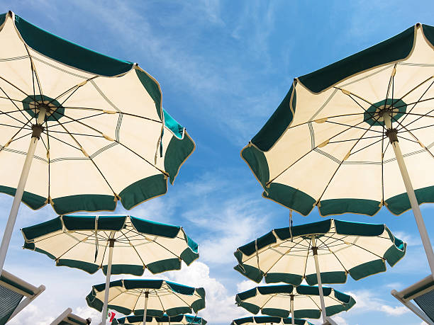 istock Rows of beach umbrellas in perspective 179003995