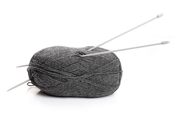 istock Ball of wool and knitting needles, white background 179004574
