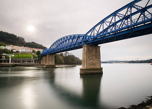 Railway bridge in Pontedeume, Galicia, Spain in a cloudy day.