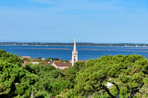 Panoramic view of Arcachon looking across the Arcachon Bay towards the shoreline of Cap Ferret, France from the viewing platform of Observatoire Saint-Cecile