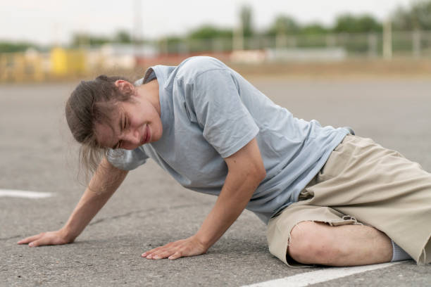 istock young man fall on the ground and have an injury 1790055182