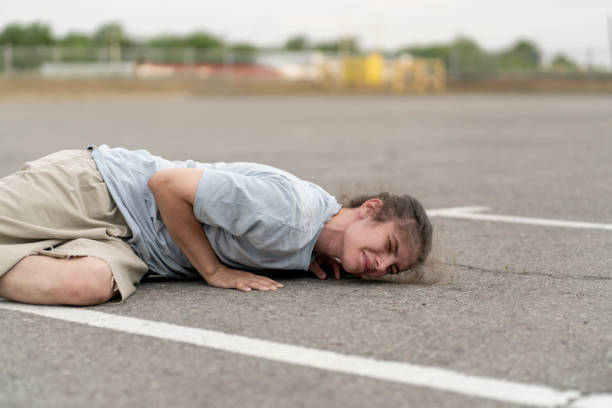 istock young man fall on the ground and have an injury 1790055187
