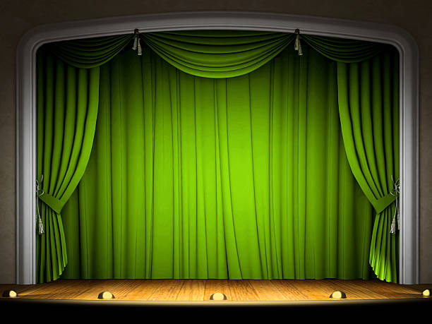 istock Empty stage with green curtain in expectation of perfomance 179006072
