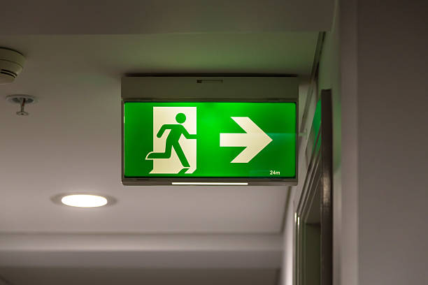 Emergency exit light sign stock photo