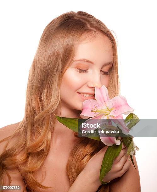 Portrait Of Young Woman With Lily Stock Photo - Download Image Now - Adult, Adults Only, Beautiful People