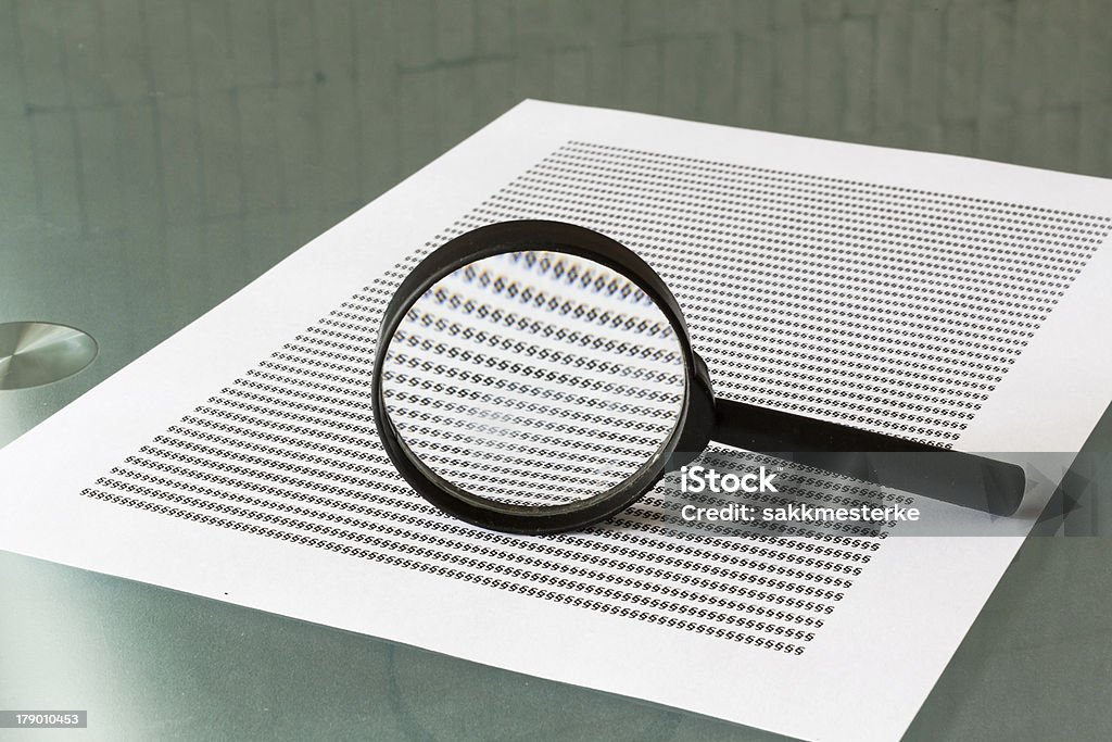 Law investigation, magnifying glass with document Law investigation, magnifying glass with document on table Analyzing Stock Photo