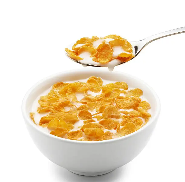 bowl of corn flakes isolated on white
