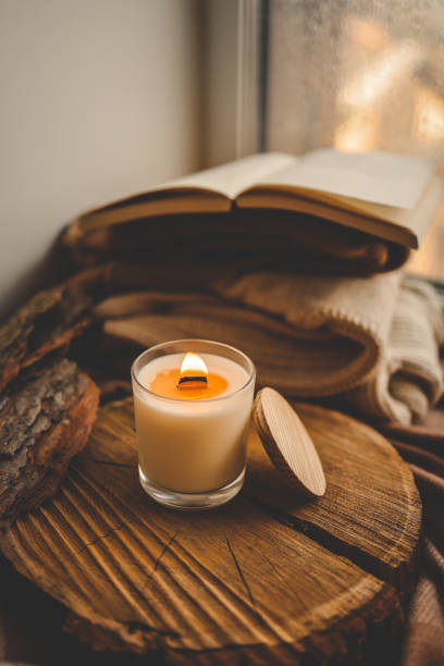 istock Burning candle in home interior, autumn aesthetics 1790113408