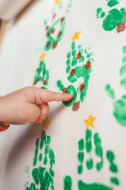 istock Baby Christmas activity idea, handprint on paper 1790116549