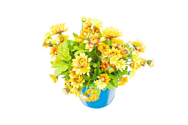 istock Plastic yellow flowers with metal blue vase hang. 179011889
