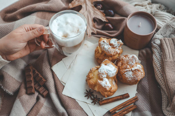 istock Cup of coffee in hands, cozy autumn 1790121385