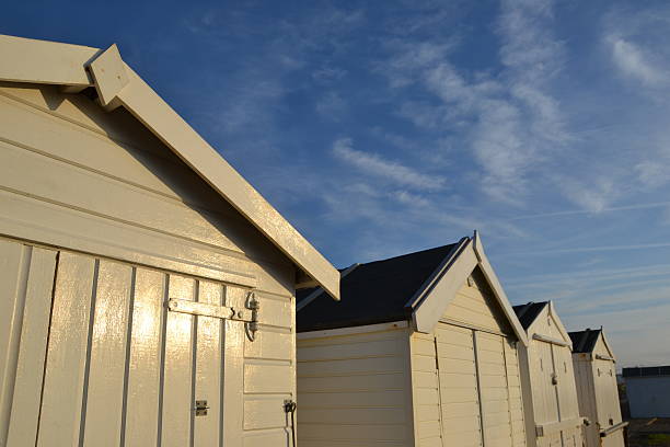 istock White Beach Huts in Goring By Sea Worthing at sunrise 179012272