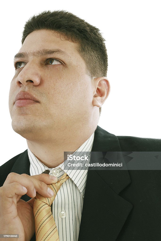 Business-Mann-Fixierung seine Krawatte - Lizenzfrei Anzug Stock-Foto